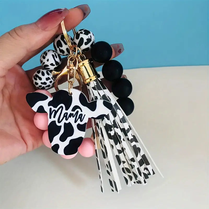 Cow-themed silicone beaded wristet keychain with Mama charm